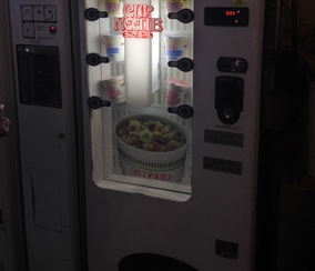 Cup of noodles vending machine in an arcade.