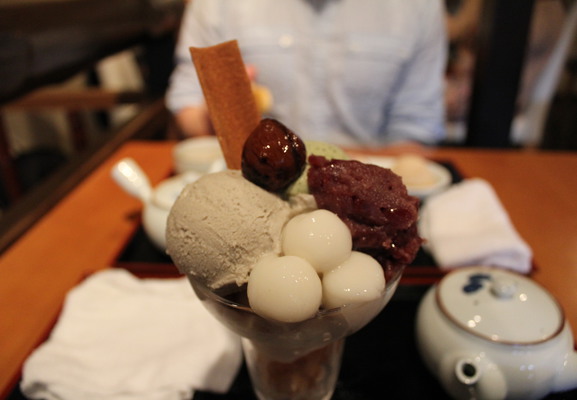 A parfait with ice cream, mochi and red bean paste.