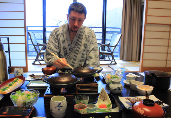 Adam eating breakfast.