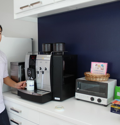 Koichi showing off the coffee maker