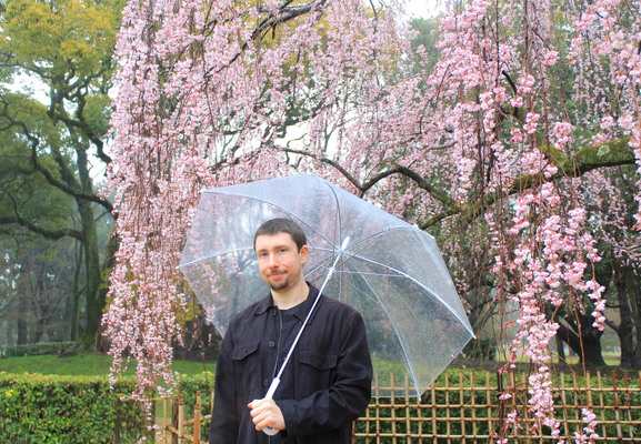 Adam under the plum blossoms.
