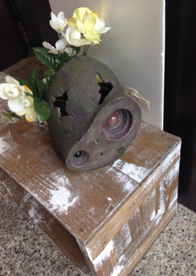 A robot soldier planter.