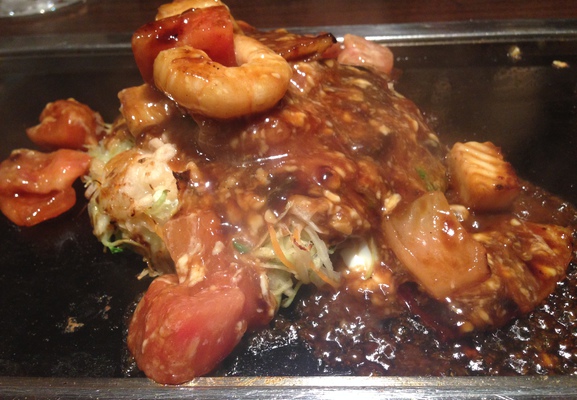 Okonomiyaki (pancake) served Tokyo style.