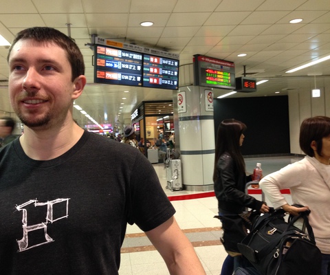 Adam waiting in line to get rail passes.