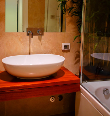 Fancy looking bathroom.